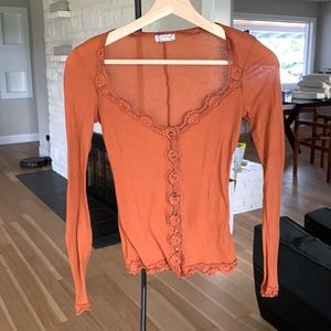 Free People burnt orange blouse